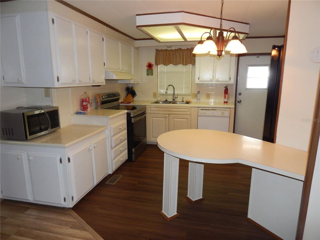 Photo of 6710 36th Avenue E #34, Palmetto, FL 34221 (MLS # A4667372)