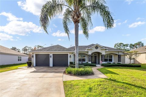 Photo of 24 Point Of Woods Drive, Palm Coast, FL 32164 (MLS # FC315096)