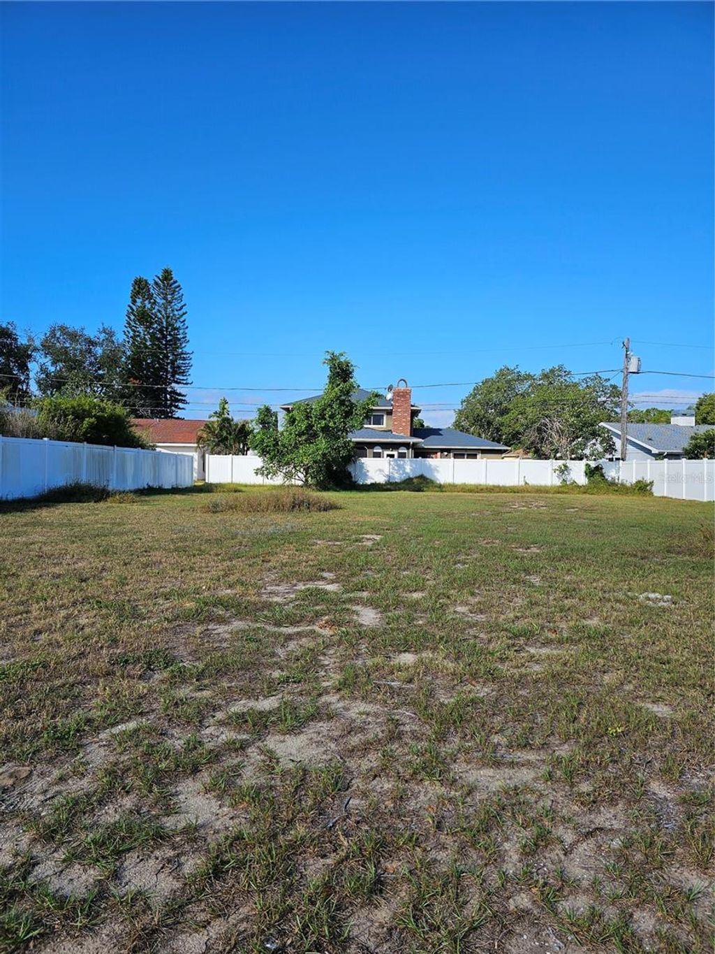 Photo of Golden Gateway Homes Kenneth Way N, Tarpon Springs, FL 34689 (MLS # TB8445567)