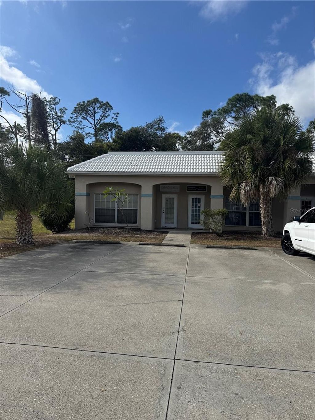 Photo of 1435 Collingswood Boulevard #A, Port Charlotte, FL 33948 (MLS # C7519776)