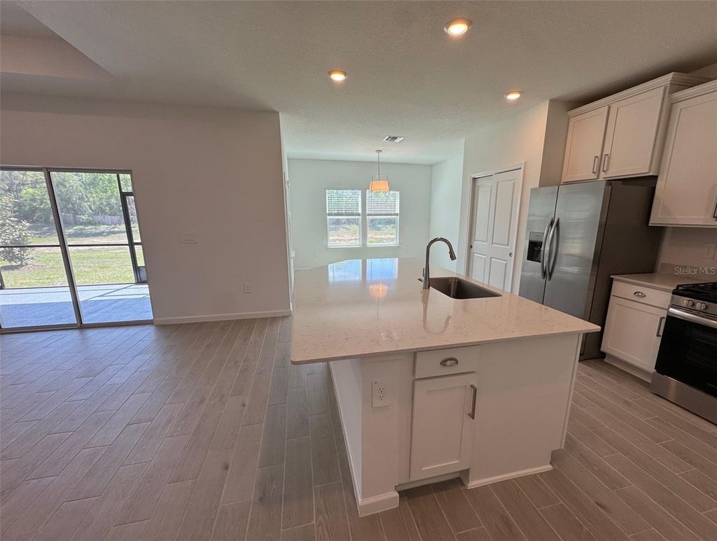 Photo of 13717 NW Convergence Boulevard, Alachua, FL 32615 (MLS # GC539119)