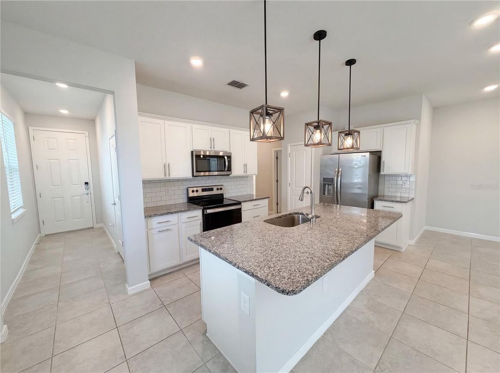 Photo of 20416 Monza Loop, Land O Lakes, FL 34638 (MLS # O6392503)