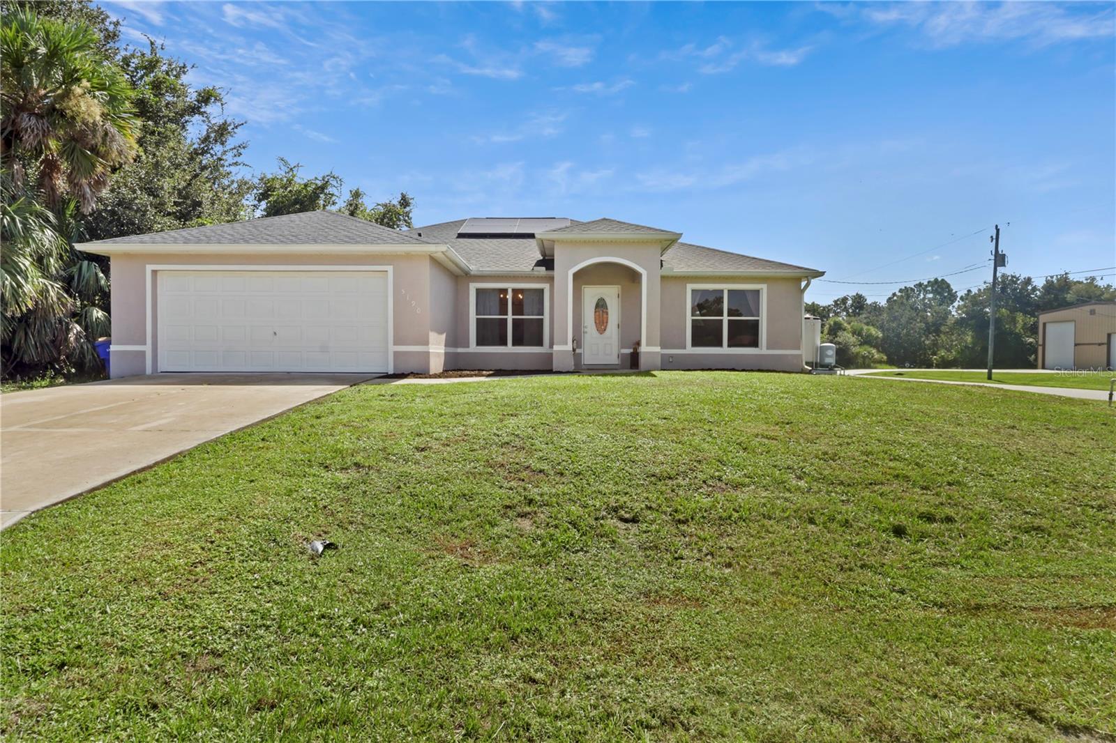 Short Sale. Welcome to this spacious 4-bedroom, 2-bath, 2-car garage home located on a large corner lot in a quiet North Port neighborhood. Featuring an open floor plan with soaring ceilings and nearly 1,800 sq. ft. of living space, this home is full of potential and requires a little tlc. The kitchen offers granite countertops, wood cabinetry, stainless steel appliances, and a pantry. The second bath includes a tall vanity, granite countertop, and modern fixtures and room to finish the updates started. Luxury vinyl flooring runs throughout the home for a stylish, low-maintenance touch. Additional features include a spacious laundry room, cost saving solar panels, a welcoming patio perfect for outdoor lounging or entertaining and a cozy firepit where you can relax and gaze up at the stars.
Enjoy easy access to local beaches, waterways, golf courses, shopping, dining, and public parks with bike trails, picnic areas, and boat ramps leading to Charlotte Harbor and the Gulf of Mexico.