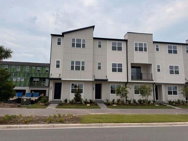 Photo of 9297 Luminary Boulevard, Orlando, FL 32827 (MLS # O6428541)