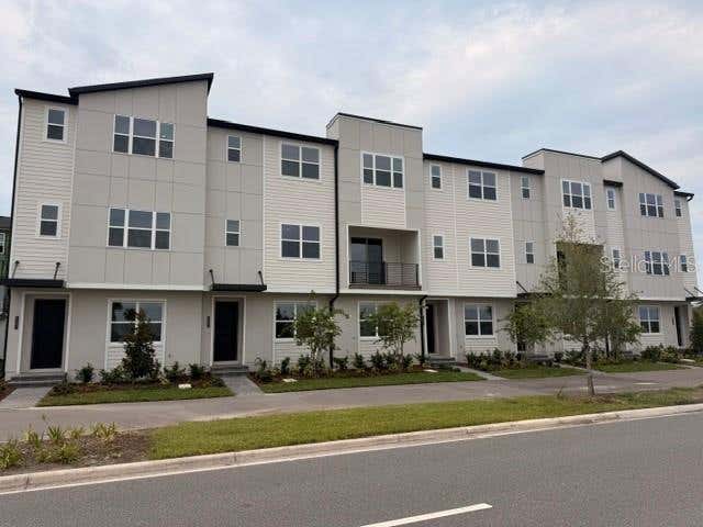 Photo of 9297 Luminary Boulevard, Orlando, FL 32827 (MLS # O6428541)