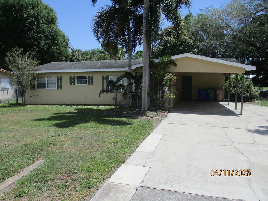 ~ LAKE OKEECHOBEE ACCESS- CHARMING 4 bedroom 2 bathroom CBS home. This Single-Family Residence is located in OKEECHOBEE ESTATES,  SPACIOUS LIVING AREA with 1740 Base SF/ 2646 TLA. This property has a large carport attached with an oversized paved parking pad. The backyard is fenced with a large screened porch for entertaining or relaxing. A shed for extra storage and a large Mango tree. Enjoy fishing with Canal access right from your backyard. The Kitchen features stainless steel appliances, lots of cabinets for storage, a dining area, large open living room. Has ceramic tile flooring throughout the home, 4 bedrooms 2 full baths with tiled walls. A large laundry room.
This home is on Public water/sewer. Come take a look at this home Today!!! All measurements are approximate must measure for exact dimensions.
