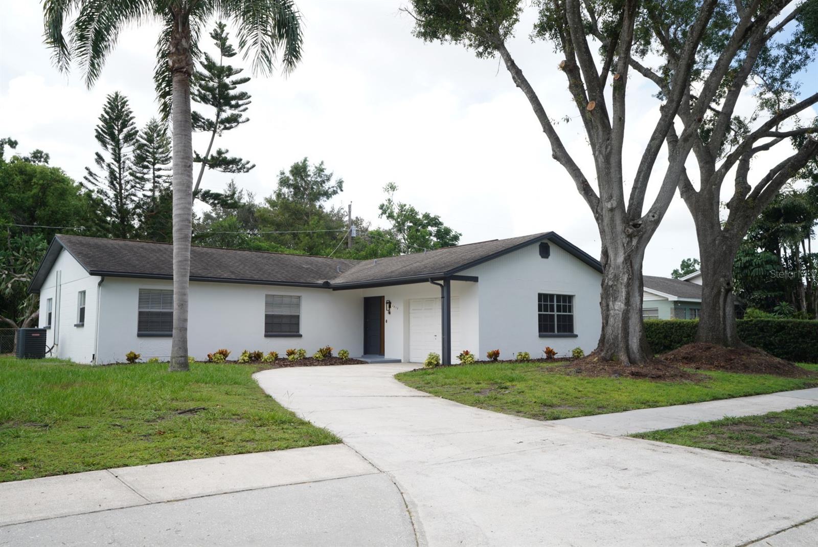 Fully Remodeled Lake Ellen Gem in Carrollwood!
2512 Lake Ellen Cir, Tampa, FL 33618
Discover modern living in the heart of Carrollwood with this beautifully remodeled 3-bedroom, 2-bath home located on the sought-after Lake Ellen Circle. Step inside to find an open-concept layout featuring luxury vinyl plank flooring, fresh interior paint, and a stunning new kitchen with quartz countertops, shaker cabinets, stainless steel appliances, and designer finishes throughout.
Both bathrooms have been fully updated with contemporary tile, vanities, and fixtures. The spacious living and dining areas offer excellent flow for entertaining, while large windows provide an abundance of natural light.
Enjoy outdoor living in the private, fenced backyard with mature landscaping and plenty of room for gatherings or relaxation. Situated in a quiet, established neighborhood just minutes from top-rated schools, shopping, dining, and parks.
This move-in-ready home blends timeless charm with stylish updates—schedule your showing today!