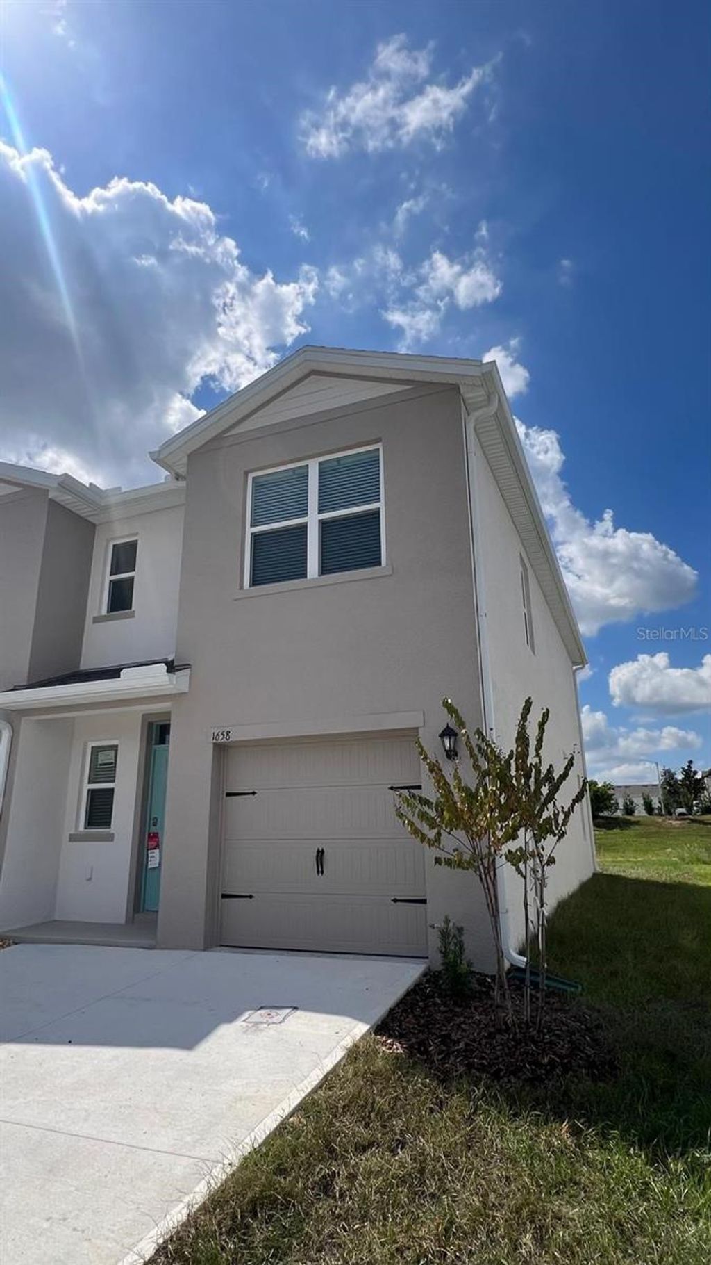 Photo of 1658 Rock Elm Rd, Davenport, FL 33837 (MLS # O6350075)