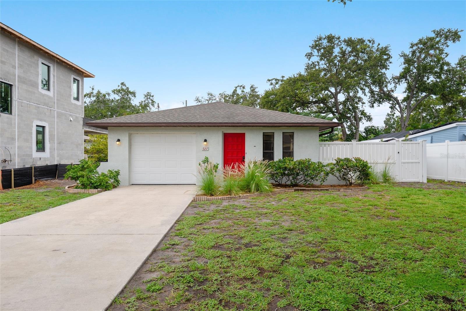 Not in a Flood Zone - High and Dry Duplex! Discover this expertly-maintained income producing, block construction duplex, perfectly positioned just two blocks from vibrant Beach Boulevard in the charming town of Gulfport. Designed to feel like single-family homes, each of the two mirrored 2-bedroom, 1-bath units are placed back-to-back with the rear unit accessible from the alleyway, offering separation and privacy. Features for both units include a spacious attached one-car garage, a full-size laundry room equipped with washer & dryer hookups, cabinetry and sink, and plenty of interior closets/storage. The open-concept living areas are bright and airy, featuring large windows and a generously sized living room. The separate kitchen and dining spaces are enhanced by sliding glass doors that flood the interiors with natural light and provide direct access to private, solid vinyl fenced side yards—ideal for outdoor relaxation and entertaining. Each unit is separately metered and features its own air conditioning system, offering true independence for residents. Gulfport is celebrated for its laid-back coastal vibe, thriving arts community, and welcoming atmosphere. With its own beach and marina, water sports like kayaking, paddle boarding, boating rental, etc, could be within your daily routine! This duplex is centrally located with easy access to downtown St. Petersburg, the nationally acclaimed Gulf beaches, and all the local dining, shopping, and events that make Gulfport so unique!