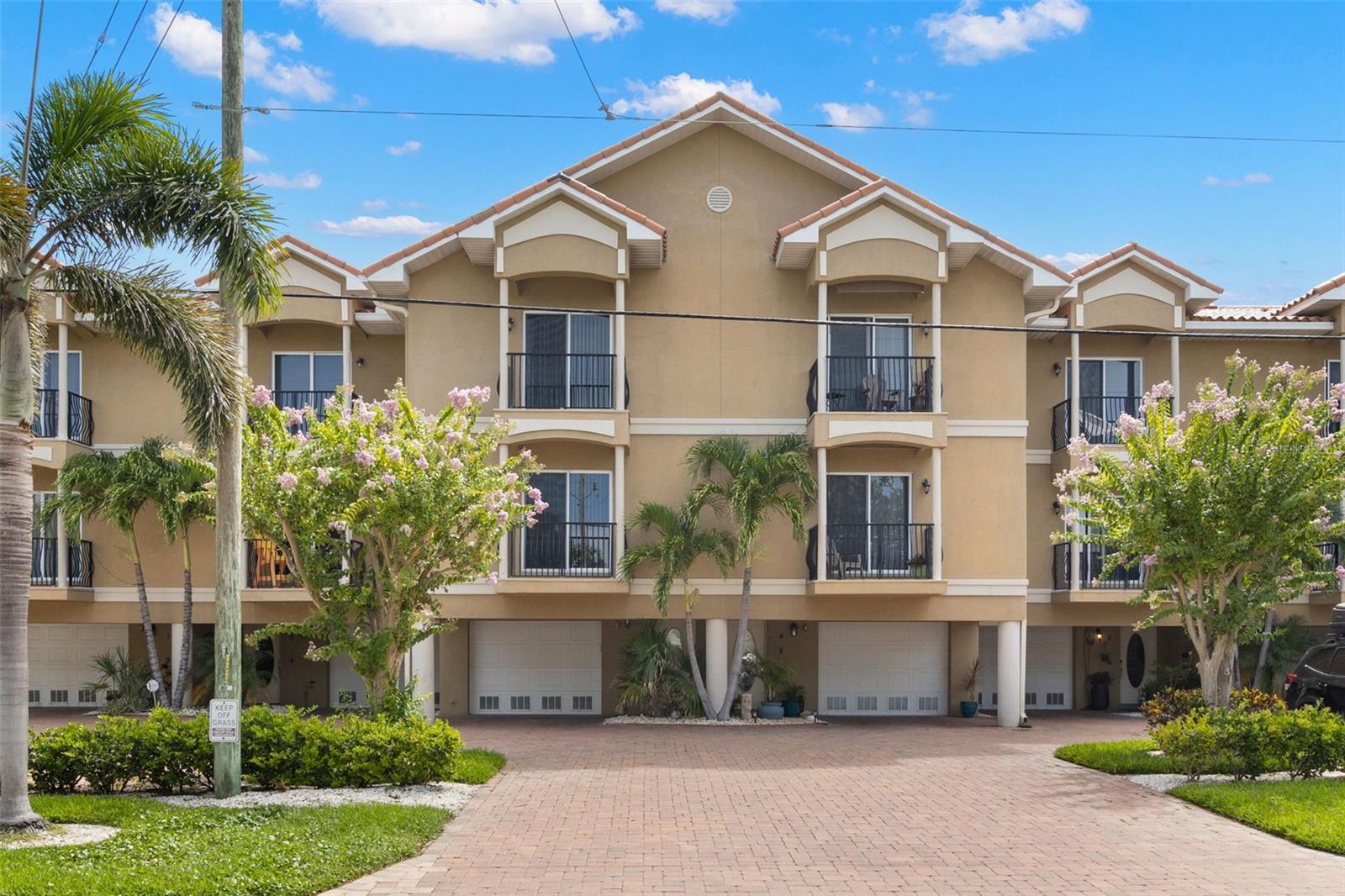 Welcome to Paradise! This luxurious waterfront townhouse is located in one of the most beautiful areas of Treasure Island, Florida on Isle of Capri. Unit has magnificent views from 5 decks with 3 bedrooms 3 baths plus 3 car garage/bonus space with private elevator. Updated kitchen with plenty of cabinets, granite counters, double sinks, stainless steel appliances, large walk in pantry, high/vaulted ceilings throughout entire home, fireplace, along with tile floor throughout 2nd floor. Magnificent wood entryway stairs and 2nd floor staircases. Bathrooms are updated as well with granite counters, master bedroom 2 large walk in closets, en suite split vanities, stall shower and jacuzzi hot tub, enclosed lav, lots of storage and private balcony. Private laundry room on 3rd floor. A/C and Water Heater new in 2020. Plenty of storage throughout home. Community offers pool, heated spa, trex sun deck, fishing off back of home along with open day dock space,(Day dock only no deeded slip). Great location short walk or bike ride to the beach, extensive boardwalk along the beach to enjoy sunsets, music, entertainment with enough distance for peaceful evenings at home. John's Pass Village, restaurants, shopping. Rosselli Community Park on Isle of Capri with lots of amenities dog park, pickleball, tennis, playground, basketball, little league baseball field, shuffleboard. located close to downtown St. Petersburg, Tampa, Airports and so much more. Truly a great location for everyone.