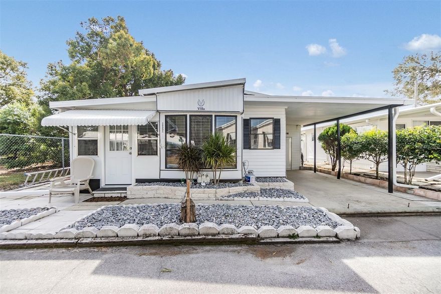 Country Aire CHARMING, REMODELED mobile home is for sale in this GATED 55+ community in Zephyrhills, Florida,
where you OWN your land! Located at the end of a private street on a premium lot with a great line of sight, this
delightful furnished one-bedroom, one-bath residence also features a den that can serve as a home office or guest
quarters, plus an inviting lanai perfect for enjoying your morning coffee in a cozy, air-conditioned setting. The kitchen
has been beautifully remodeled just three years ago, showcasing a modern white design with Stunning GRANITE
countertops and updated lighting fixtures that enhance the home's ambiance. The 2021 refrigerator and range provide
contemporary convenience in the light, bright kitchen. The home features laminate floors throughout the main living
areas, while the lanai and den are cozily carpeted. With efficient AC wall units for cooling and updated water lines,
including a newly renovated bathroom with a new commode and sink, this home combines comfort and style. The lowmaintenance hardscape lawn makes yard work a breeze, allowing you to enjoy recreational facilities and private roads
as part of the HOA fee, which also includes cable with two boxes, water, sewer, and trash services. Additional features
include exterior awnings on the front and side doors, blinds, and curtains for privacy, and a propane tank under the
house for the gas range. Exterior shed houses the washer and dryer and has room for a workshop. This fully furnished
gem is truly a peaceful retreat offering a comfortable living space. Located in Sunny Florida north of Tampa with easy
access to major highways for easy commute to Lakeland, Tampa, Orlando, Airports, shopping, restaurants, medical
facilities, theater, bowling and YMCA. With its modern updates and convenient amenities, this home is the perfect place
to enjoy a relaxing lifestyle in a serene Florida setting and IS move in ready for you to call Home! For your private
showing... CALL TODAY!