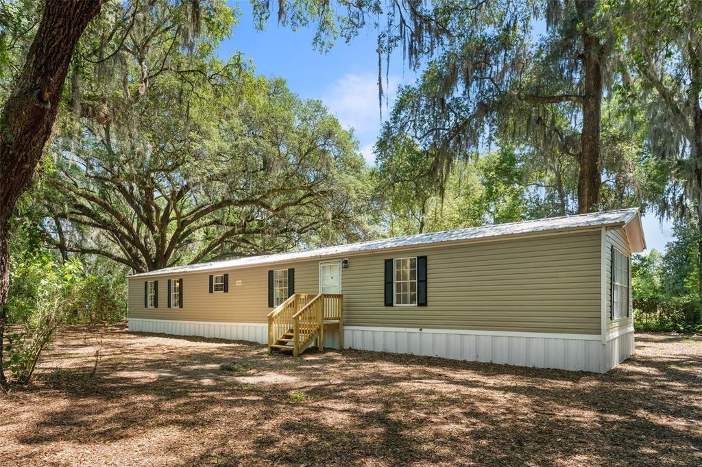 Photo of 102 Tree Farm Road, Hawthorne, FL 32640 (MLS # GC540021)
