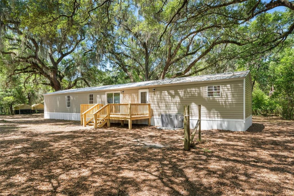 Photo of 102 Tree Farm Road, Hawthorne, FL 32640 (MLS # GC540021)