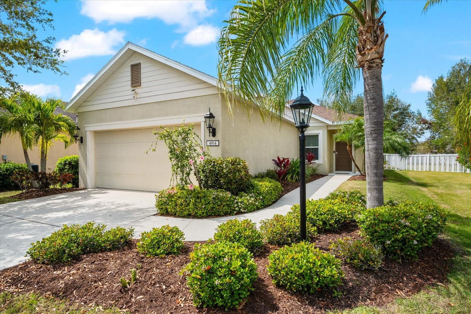 Brimming with charm and nestled in the highly sought-after neighborhood of Central Park at Lakewood Ranch, this beautifully updated 2-bedroom, 2-bath home is a must-see! Offered with the potential for turnkey furnished living, this Neal Communities-built Freedom 2 / Cruise Series home boasts 1,313 sq. ft. of light-filled, neutral-toned space designed for both comfort and style. Recent upgrades, including new windows, new slider glass, and stylish window treatments, enhance its inviting ambiance. The flexible dining area, custom closets, screened lanai, and gas appliances add to its appeal, while the spacious, fenced-in backyard freshly sodded and enhanced with lush plantings for privacy is shaded by two magnificent mature trees, creating the perfect outdoor retreat. Beyond your doorstep, Central Park's impressive 10-acre amenities center offers something for everyone including your four-legged friends! Stroll through the serene butterfly garden, enjoy a game of tennis, or take advantage of the playground, splash park, sports fields, and covered pavilion. The dedicated dog park makes this community especially welcoming for pet owners, providing the perfect space for pups to play and socialize.