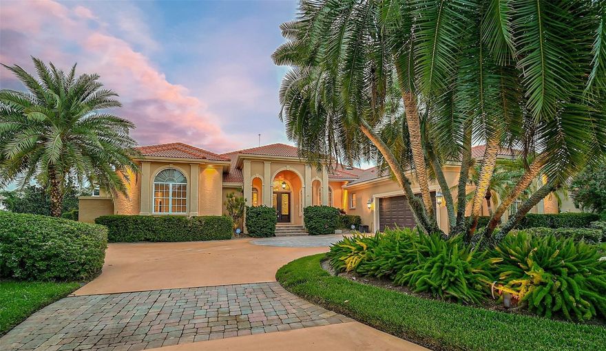 **STUNNING GOLF COURSE ESTATE in the Highly Sought-After OAKS COUNTRY CLUB Community** situated on an Over Half Acre Lot overlooking the 12th Fairway of the interior, HERON GOLF COURSE.  With its delightful curb appeal and manicured landscape, this splendid residence offers 3 BEDROOMS + Spacious Executive Office/Study, 3 FULL and 1 HALF BATHS, High Ceilings, Crown Moldings, Gas Fireplace, spacious Kitchen with Granite Counters and Stainless Steel appliances, 2-Car Garage w/ Circular Driveway, and much more! An Expansive Primary Bedroom Suite features multiple walk-in closets and an Updated Primary Bathroom with dual vanities, soaking tub, custom-tiled shower and private outdoor shower.  Ultimate enjoyment of the outdoors is made possible with an expansive screened lanai featuring a Large 45ft Pebble-Tec Pool & Spa, Outdoor Kitchen space (without appliances) and an abundant covered seating area.  Recent UPDATES include Freshly Painted Interior (2024), NEW POOL CAGE (2023), NEW ROOF (2018), HVAC (2018), Pool Pump, etc.  THE OAKS is a distinguished, 24hr Guarded, Country Club Community which boasts many accolades including: Platinum Club of America, Emerald Club of the World, Elite Distinguished Club of the World and One of America’s Healthiest Clubs - where amenities include Three Restaurants, Ballroom, Two 18-hole championship GOLF courses, award-winning RACQUETS program with 12 Har-Tru Hydro-Grid TENNIS courts, 4 PICKLEBALL Courts, wonderful CROQUET facility, state-of-the-art FITNESS center and junior Olympic, heated community SWIMMING POOL, Bocce, Basketball Court, Playground and more! The Oaks is just minutes from nationally ranked Pine View School, the Legacy Bike Trail, area Beaches and all that Gulf Coast living has to offer. Membership is required and there is NO WAITLIST for GOLF or SOCIAL Membership.  **ENJOY THE 3D VIRTUAL TOUR and AERIAL VIDEO**