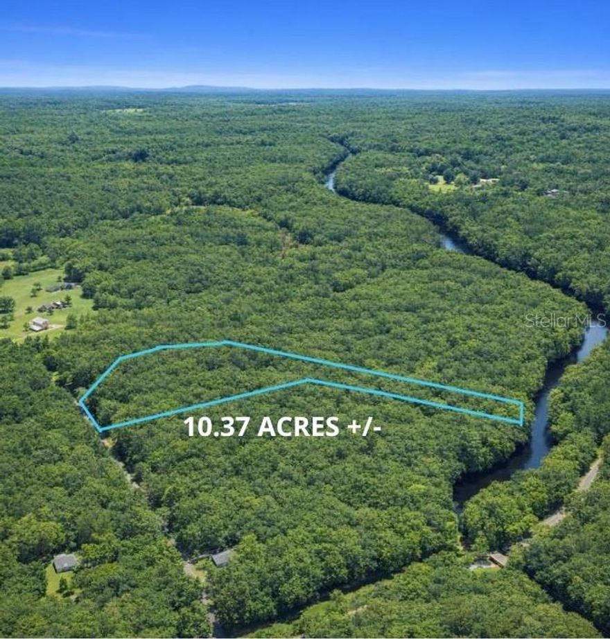 Discover the potential of this 10.37-acre vacant parcel in Ocklawaha, Florida with a ***SURVEY AVAILABLE WITH WETLAND DELINEATION** ***ACCESS TO THE RIVER***, offering a rare opportunity for builders, developers, investors, or buyers looking to create a private estate with room to grow. With no HOA and no deed restrictions, this property provides the flexibility and freedom to bring your vision to life without added limitations. This spacious tract offers excellent potential for building, with ample room for a custom home, multiple structures, recreational use, or future development possibilities. Whether you’re looking to invest in land, create a private retreat, or explore development opportunities in a growing area, this property delivers versatility and long-term potential. Located in Marion County, Ocklawaha is surrounded by Florida’s natural beauty and is known for its access to outdoor recreation including lakes, trails, forests, and the nearby Ocala National Forest. Residents and visitors enjoy boating, fishing, kayaking, hiking, and exploring the many springs and waterways throughout the region. Whether you’re planning to build now or hold as a future investment, this property offers space, flexibility, and opportunity in one of Central Florida’s growing land markets. Call for more information today!!!!  (LOT NEXT TO IT IS ALSO FOR SALE WITH 10.38 Acres and HAVE ACCES TO THE RIVER, ASK FOR MORE INFO)
