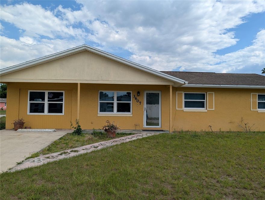 This three bedroom, one and one-half bath home is ideally situated in Mims, Florida, a Central Florida Community.  Boasting over 1500 square feet, with an expansive screened in porch (552 sq feet) on a 0.24 acre corner lot, this home is ripe with possibilities for a new family or investor with a vision.  This lovely home has a formal living room, with a bar to the kitchen, a dining area, and a family room.  Watch Mims Little League games from Holder Park, watch space launches from the yard, or go to the nearest beach, which is less than 15 miles away.  Conveniently located near I-95, there is ease of accessiblity to Central Florida activities.  DO NOT HESITATE-CALL TODAY!  Reroof (2018); HVAC (2016); Windows replaced (2015)