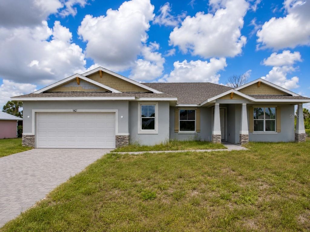 Photo of 142 Fairway Road, Rotonda West, FL 33947 (MLS # O6411981)