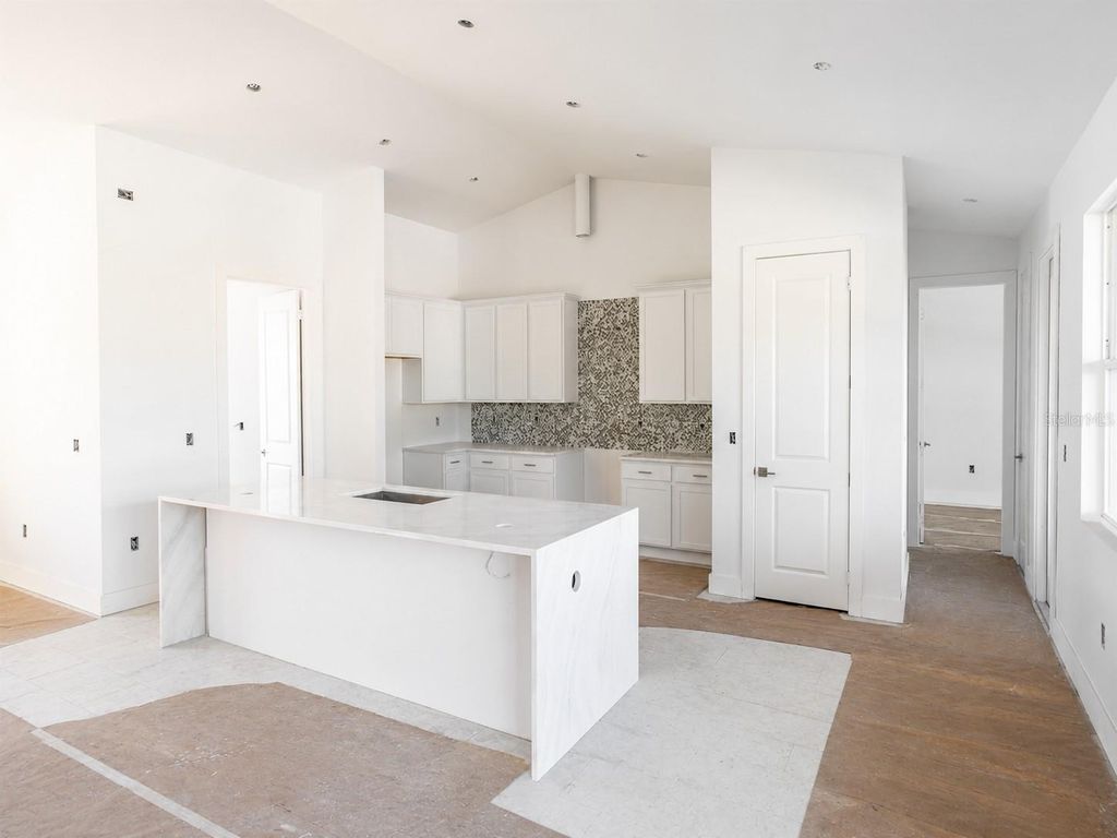 Photo of 142 Fairway Road, Rotonda West, FL 33947 (MLS # O6411981)
