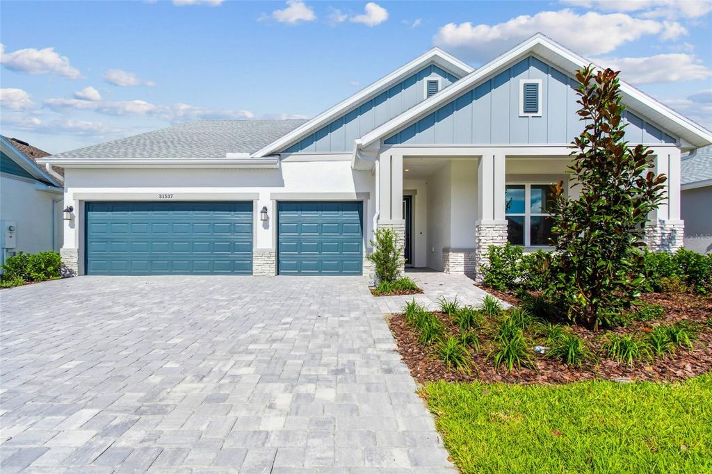 Photo of 31537 Hayman Loop, Wesley Chapel, FL 33545 (MLS # TB8417985)