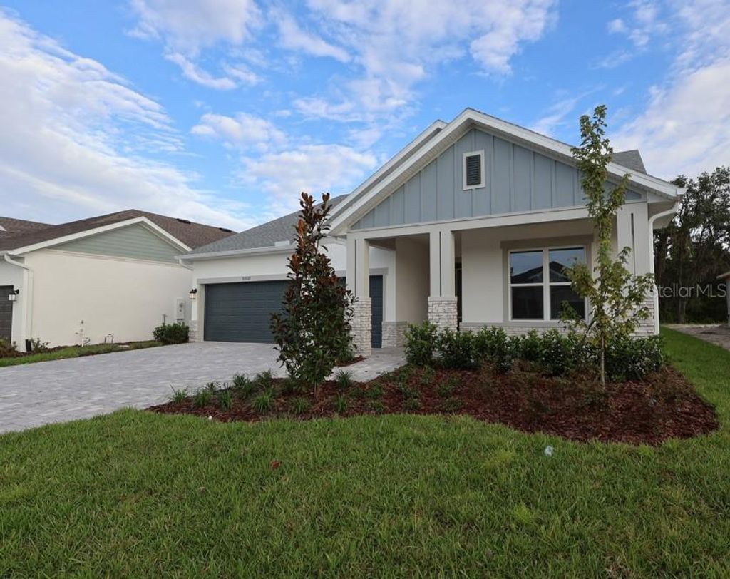 Photo of 31537 Hayman Loop, Wesley Chapel, FL 33545 (MLS # TB8417985)