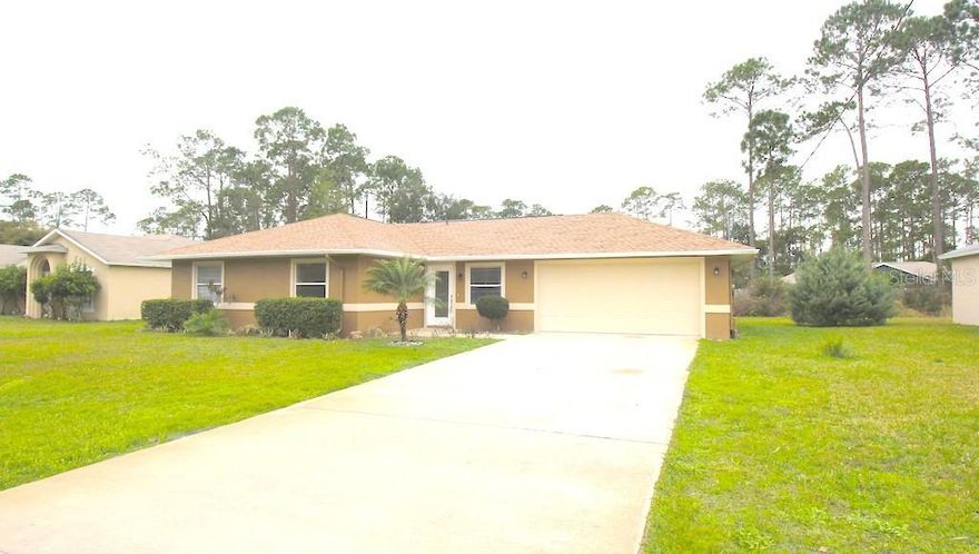 Roomy 4 bedroom, 2 bath, 2 car garage home for sale in Palm Coast FL. This home features tile and laminate flooring throughout making it the perfect home for low maintenance living. Bedrooms feature ceiling fans, the kitchen boasts stainless appliances. Exit the dining area sliding doors to a huge 36x14 screened lanai, great for entertaining and relaxing privately, overlooking the huge back yard. The home is conveniently located close to everything Palm Coast offers, including entertainment, schools, shopping, parks, walking paths, Town Center, and more! Easy access to major roadways and the I95 provides for speedy commute to both Jacksonville and Daytona Beach. Enjoy an easy drive to the beautiful local Flagler Beach. Tenant occupied, all pictures and videos prior to tenant occupancy. Make an offer today!