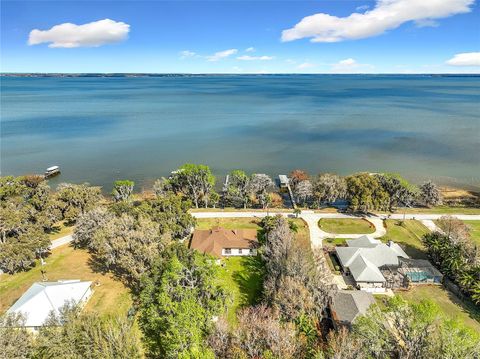 Photo of 8408 Lakeshore Drive, Yalaha, FL 34797 (MLS # G5108648)