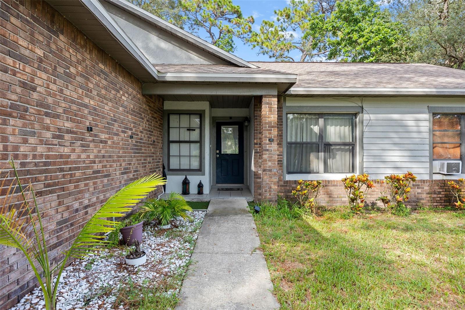 1% lender credit towards closing costs with preferred lender! Welcome to 5385 Aeolus Way. This spacious 3-bedroom, 2-bathroom pool home offers 1,712 square feet of living space with endless potential. Enjoy the benefits of a large bonus room, home office, or game room to design as well! The property combines convenience with the charm of a quiet residential setting. Inside you’ll find a split floor plan with generously sized bedrooms and vaulted ceilings that create an open feel. The kitchen features stainless steel appliances, wood cabinetry, and a walk-in pantry. The primary suite includes double vanities, a soaking tub, and a separate shower. Out back, enjoy Florida living in the screened-in pool and covered patio overlooking a private, tree-shaded yard. The exterior highlights a two-car garage, brick front accents, and mature landscaping. While the property could benefit from some updates and TLC, its solid layout, desirable features, and prime location make it an excellent opportunity for both homeowners and investors.