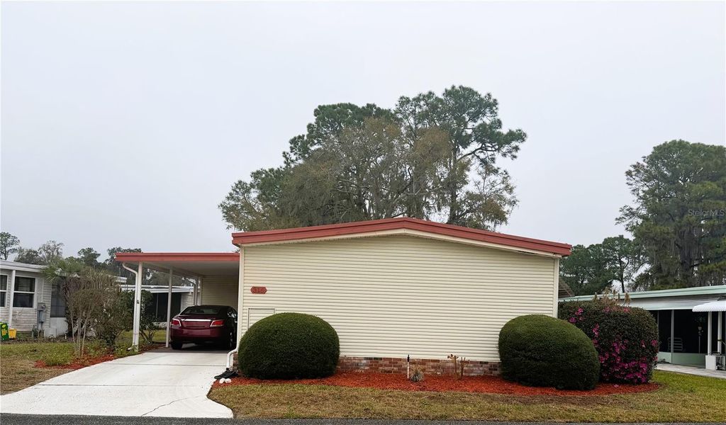 Photo of 316 Palo Verde Drive, Leesburg, FL 34748 (MLS # R4910792)