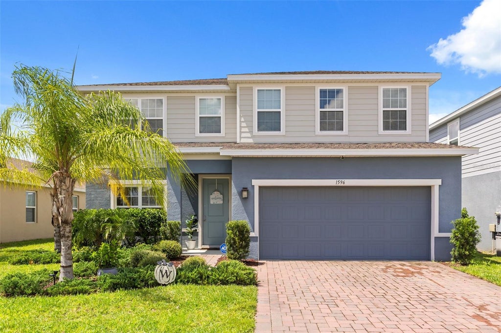 Photo of 1596 Eucalyptus Way, Davenport, FL 33837 (MLS # O6441315)