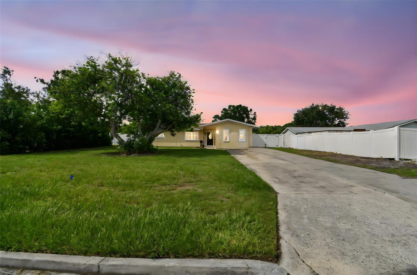 Welcome to this beautifully updated home in the desirable Lakewood Estates Golf Community, perfectly situated just minutes from Downtown Tampa, St. Pete Beach, gulf beaches, and with easy access to I-275. This property features a spacious kitchen with modern white cabinets, white granite counters, and stainless steel appliances, along with a tankless water heater. The three-way split floor plan offers privacy with a huge master bedroom and spacious walk-in closet on one side, kids’ rooms on another, and a fourth bedroom set apart for guests or an office. Additional highlights include custom shutters throughout, a Tesla charger, and ample parking for a boat or trailer. Outside, enjoy Florida living with a pool area under a pergola, French doors leading out, and a covered area with bar setup perfect for entertaining. While the two backyard sheds do not convey, the property’s open layout, modern upgrades, and no deed restrictions make this home a true standout.
