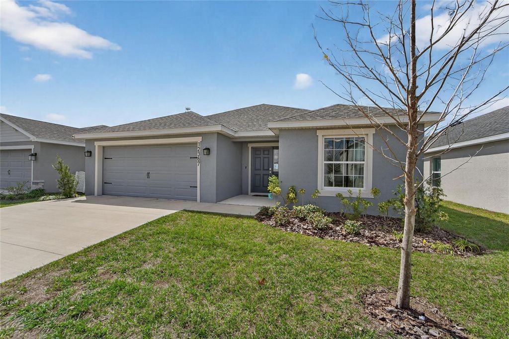 Photo of 12367 Marshland Street, Riverview, FL 33579 (MLS # TB8482830)