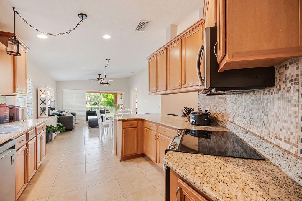 Photo of 11830 Iselle Drive, Orlando, FL 32827 (MLS # O6408902)