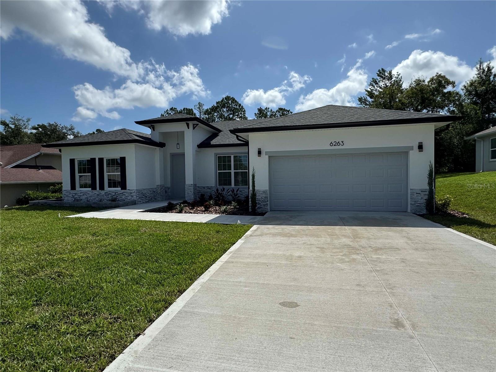 6263 N WHISPERING OAK LOOP