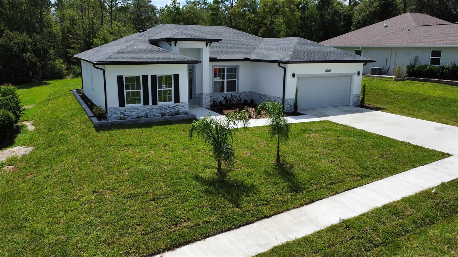 6263 N WHISPERING OAK LOOP