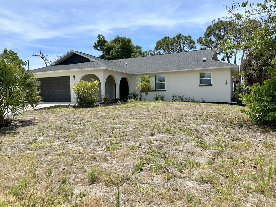 ANNUAL RENTAL! Waterfront single-family home located in the Gulf Aire subdivision. This beautifully renovated 3-bedroom, 2-bathroom home features wood laminate flooring throughout and an updated kitchen with all the bells and whistles. When you walk through the front door, you are welcomed by a spacious great room with plenty of room to entertain guests or enjoy time with family. The primary bedroom is privately situated away from the guest bedrooms and features an ensuite bathroom with dual granite vanities, a large walk-in closet, and an updated walk-in shower with stone flooring. The kitchen offers stainless steel appliances including a refrigerator, dishwasher, range, and microwave, along with granite countertops that extend into a breakfast bar. Just off the kitchen is the dining area with updated light fixtures throughout the home. The guest bedrooms are conveniently located near the shared guest bathroom, which has also been updated with a granite vanity and a beautiful walk-in tile shower. Step outside onto the screened-in lanai and enjoy peaceful waterfront views and true Florida living. The canal leads to Rocky Creek and out to Lemon Bay. A small dock has been added for leisure fishing and relaxing by the water. Additional updates include impact windows and a new roof installed in 2022. Don’t miss your opportunity to view this beautiful waterfront rental — schedule your showing today!