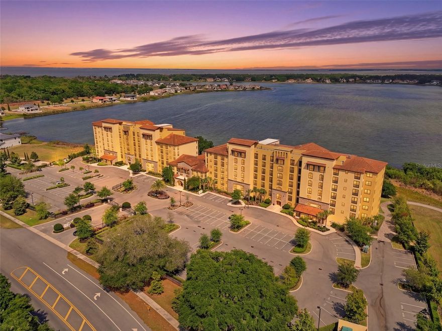 Welcome to elevated, maintenance-free living at its absolute finest in Siena at Bella Collina. This stunning TOP FLOOR residence offers the BEST unobstructed views of Lake Siena and the surrounding rolling hills.  This move-in ready home has over 1,400 square feet of beautifully updated space with two bedrooms and two full baths plus one-half bath. 

From the moment you walk in, you feel the serenity. Natural light pours in, the views immediately draw you out to the balcony, and everything about the home feels calm, refined, and effortlessly luxurious. The open-living and dining areas flow seamlessly into a modern designer kitchen featuring quartz countertops, stainless steel appliances, custom cabinetry, and elegant pendant lighting.  Making it just as perfect for quiet mornings as it is for entertaining. 

The primary suite is a true retreat with serene water views, luxury vinyl plank flooring, and a spa-inspired bath with dual vanities, a soaking tub, and a spacious walk-in shower. While the second bedroom is ideally situated for guests or a home office. 

Step onto your private balcony and take in the peaceful lakefront setting, enjoy your morning coffee or unwind with a glass of wine at sunset.  Living in Siena at Bella Collina makes every day feels like a getaway, with a gated entrance, a beautifully appointed clubhouse, state-of-the art fitness center, heated resort style pool, scenic walking paths around Lake Siena, and an inviting fire pit area.  All just minutes from the top-rated private Montverde Academy, the Florida Turnpike, top rated hospitals, and world-class golf. This is more than a condo, it is a lifestyle that blends luxury, convenience, and serenity in one of Central Florida’s most sought-after communities. Once you’re here, you truly will not want to live anywhere else. 
Schedule your showing today!
