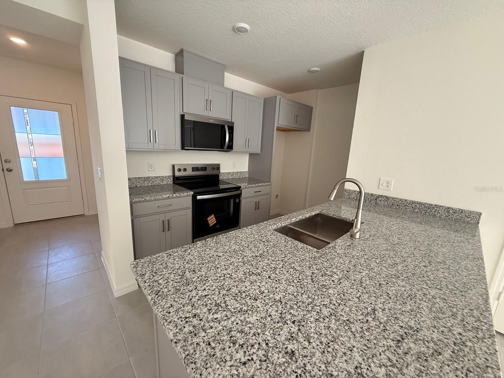Photo of 16607 Luminary Loop, Clermont, FL 34714 (MLS # O6402405)