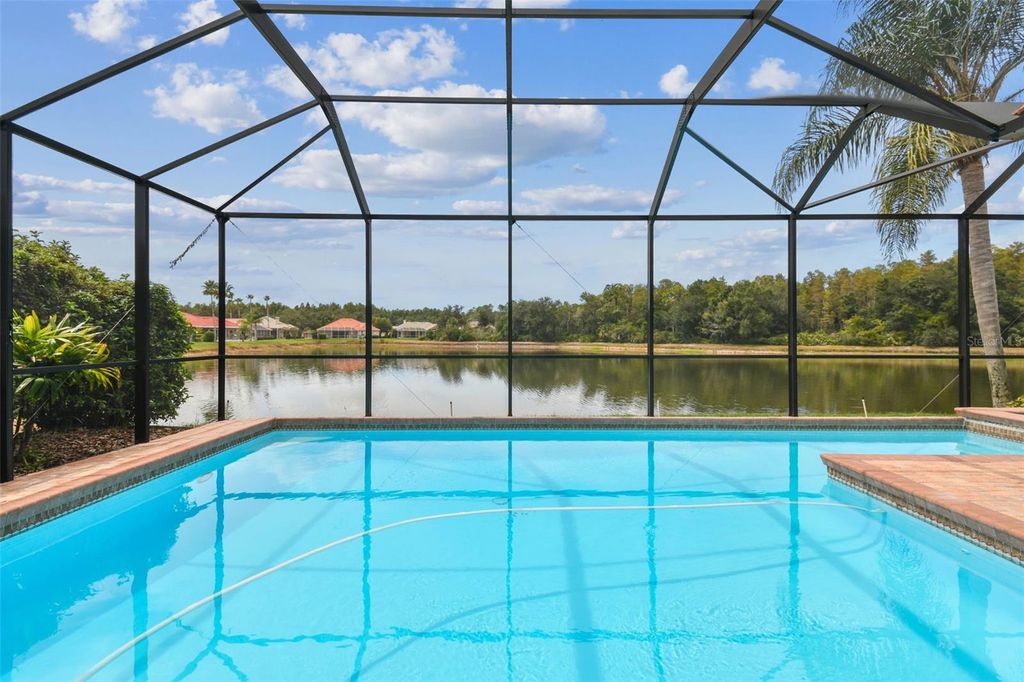 Photo of 10218 Waterside Oaks Drive, Tampa, FL 33647 (MLS # TB8426971)
