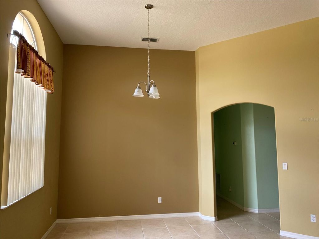 Photo of 12934 Colonnade Circle, Clermont, FL 34711 (MLS # OM721060)