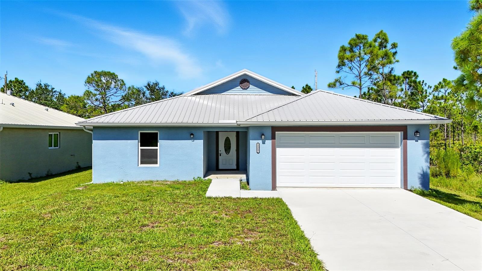 Welcome to your 2025 Brand-New, 3-bedroom, 2-bath home in the heart of Punta Gorda. Step inside to an open floor plan that flows smoothly through the main living spaces. Elegant tray ceilings make the rooms feel bright and spacious. The kitchen is a showstopper with stainless steel appliances and patterned tile that adds charm and warmth, perfect for everyday meals or hosting guests. The primary suite is your private retreat with lots of natural light, a large walk-in closet, and a spa-like bath. Enjoy dual sinks, a marble-tiled walk-in shower, and premium finishes that bring a touch of luxury. Two more bedrooms offer plenty of space for family, guests, or a home office, with a second full bath designed to match the home’s modern feel. Outside, relax on the covered patio with your morning coffee or evening drink. The backyard is spacious and ready for whatever you dream; gardening, outdoor living, or even a pool. This is also in a X flood zone which does not require flood insurance. Located in quiet Tropical Gulf Acres with no HOA, this home offers quick access to US-41 and I-75. You’ll be just minutes from downtown Punta Gorda, Fishermen’s Village, the Harborwalk, marinas, parks, and top-rated schools. This is the perfect full-time home or sunny Florida getaway. Schedule your own personal tour today!
