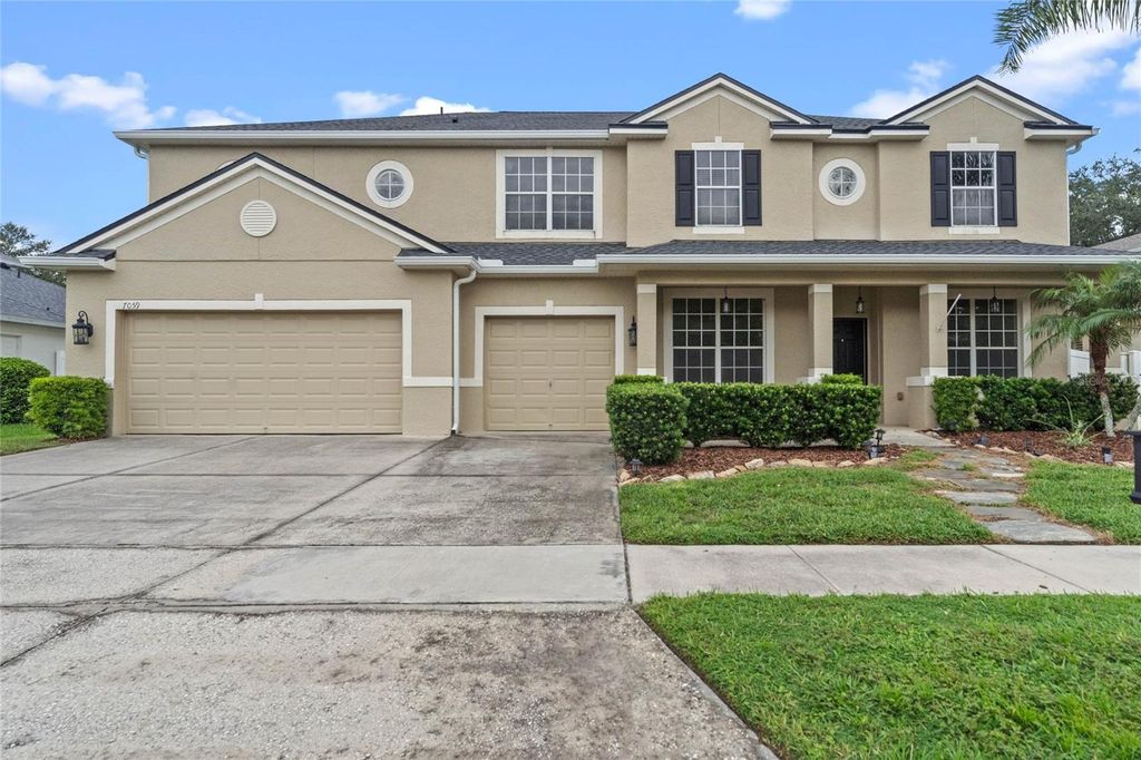 Photo of 7059 Winding Lake Circle, Oviedo, FL 32765 (MLS # O6354143)