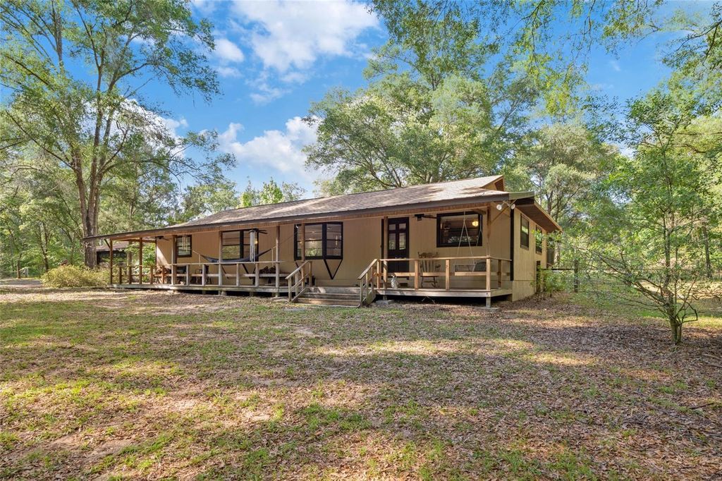 Photo of 15700 Doe Trail, Brooksville, FL 34601 (MLS # TB8500654)