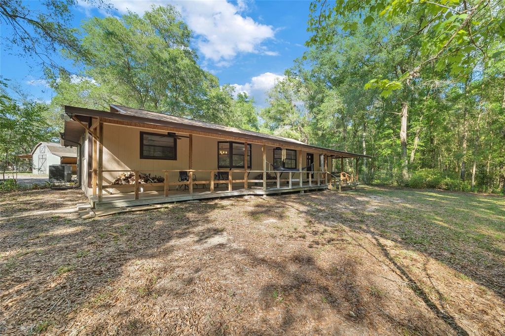 Photo of 15700 Doe Trail, Brooksville, FL 34601 (MLS # TB8500654)