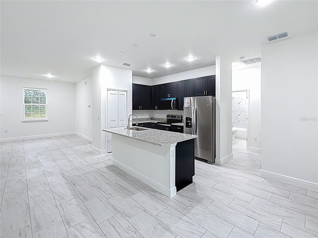 Photo of 117 Marion Oaks Golf Way, Ocala, FL 34473 (MLS # O6366644)