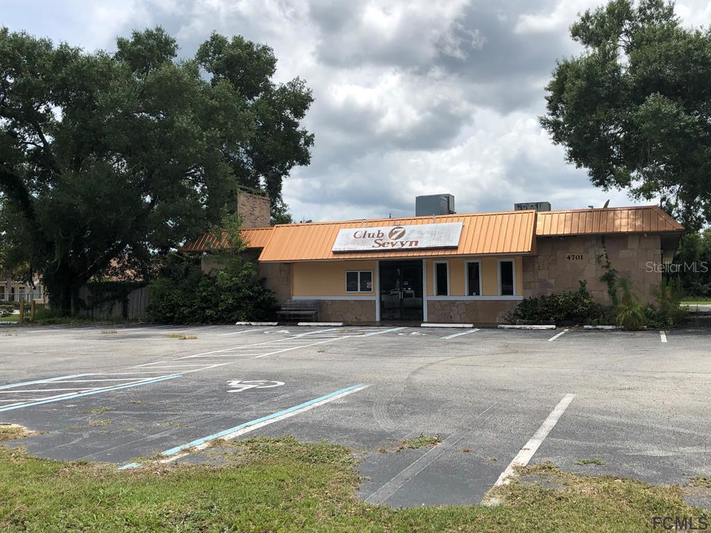 Location, location, location on busy SR 100. Look no further for the perfect restaurant, sports bar or nightclub set up. This property qualifies for a SRX full liquor license. This property has 8749 heated square feet and includes a full bar, dance floor, kitchen, stage, DJ booth, restrooms, private office and plenty of parking. Excellent location near Super Target and Tractor Supply. 5 minutes from the new BJ's Wholesale Club, and less than 15 minutes to Flagler Beach.