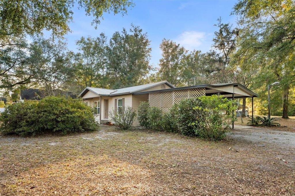 Photo of 5739 NE 60th Avenue, High Springs, FL 32643 (MLS # OM714907)