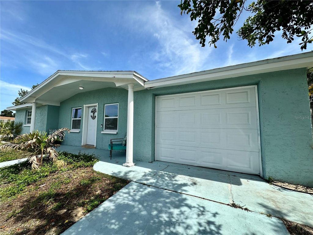 Photo of 3240 Briar Cliff Drive, Holiday, FL 34691 (MLS # TB8491452)