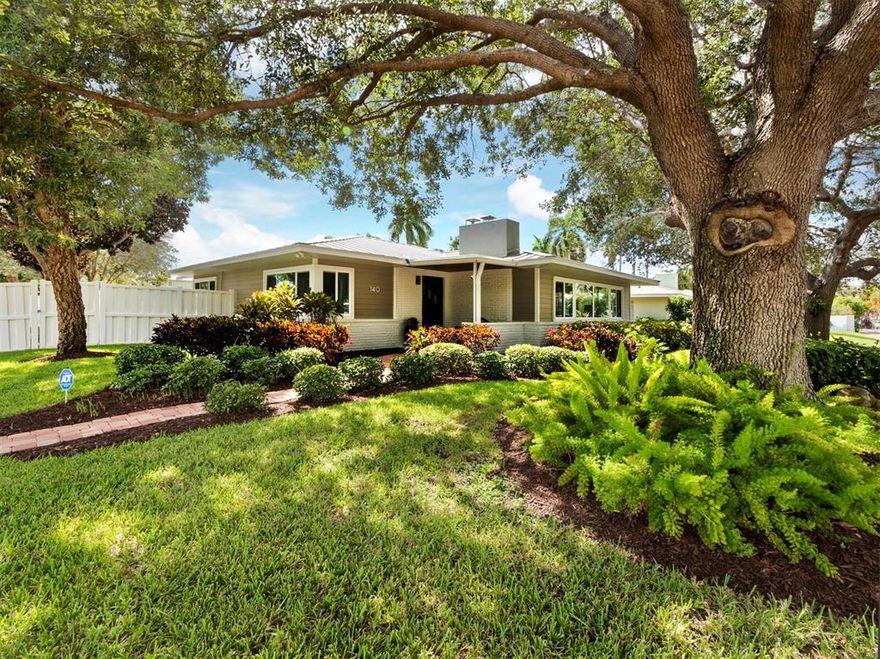 Savor the spaciousness and serenity of a sprawling corner lot in one of the best locations on the Suncoast, just a quick stroll to the shopping, dining and entertainment attractions of St. Armands Circle and Lido Beach. A host of modern touches have been implemented to complement the retro design elements of this 3BR/2BA, 2,206-sq.-ft. home to create a space of authentic character, style and panache. Gorgeous wood floor flows throughout the split floor plan and harmonizes beautifully with the original, cozy fireplace in the living room. Both the kitchen and master suite have been masterfully updated, with the kitchen boasting rich wood cabinetry, an eat-in area opening to the pool, and solid surface counters, and the master with gorgeous wood accent walls a voluminous walk-in closet, and bath with dual vanities and access to the pool. Outside, your tropical oasis awaits, where relaxing afternoons or evening soirees poolside are yours to enjoy, with the open pool, brick pavered lounging area and stately pergola with an electronic shutter roof for added shade – all surrounded by a privacy fence. This is an outstanding opportunity to live within proximity to St. Armands Circle and its full menu of amenities and conveniences.
