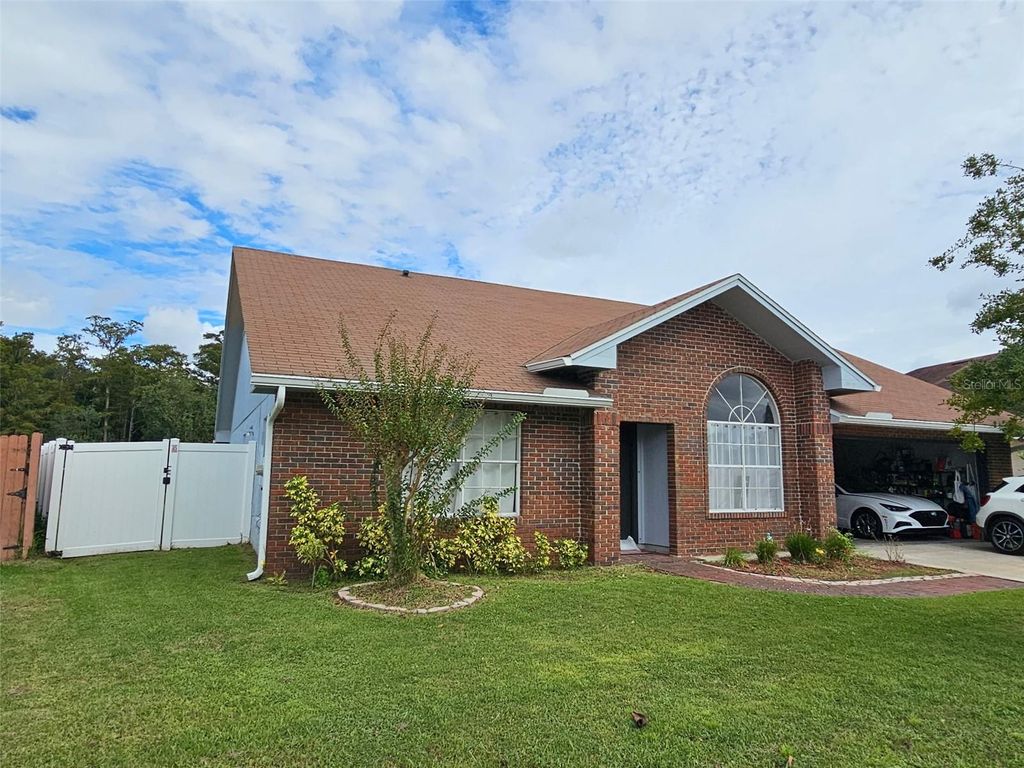 Photo of 1927 Gamboge Drive, Orlando, FL 32822 (MLS # S5145534)